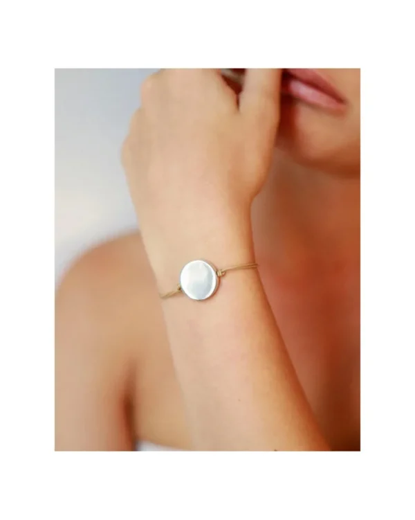 PULSERA DE CORDÓN CON DISCO GRANDE DE PLATA Y CIERRE DORADO HELENA ROHNER